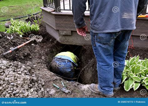 digging around electrical boxes|digging into electrical lines.